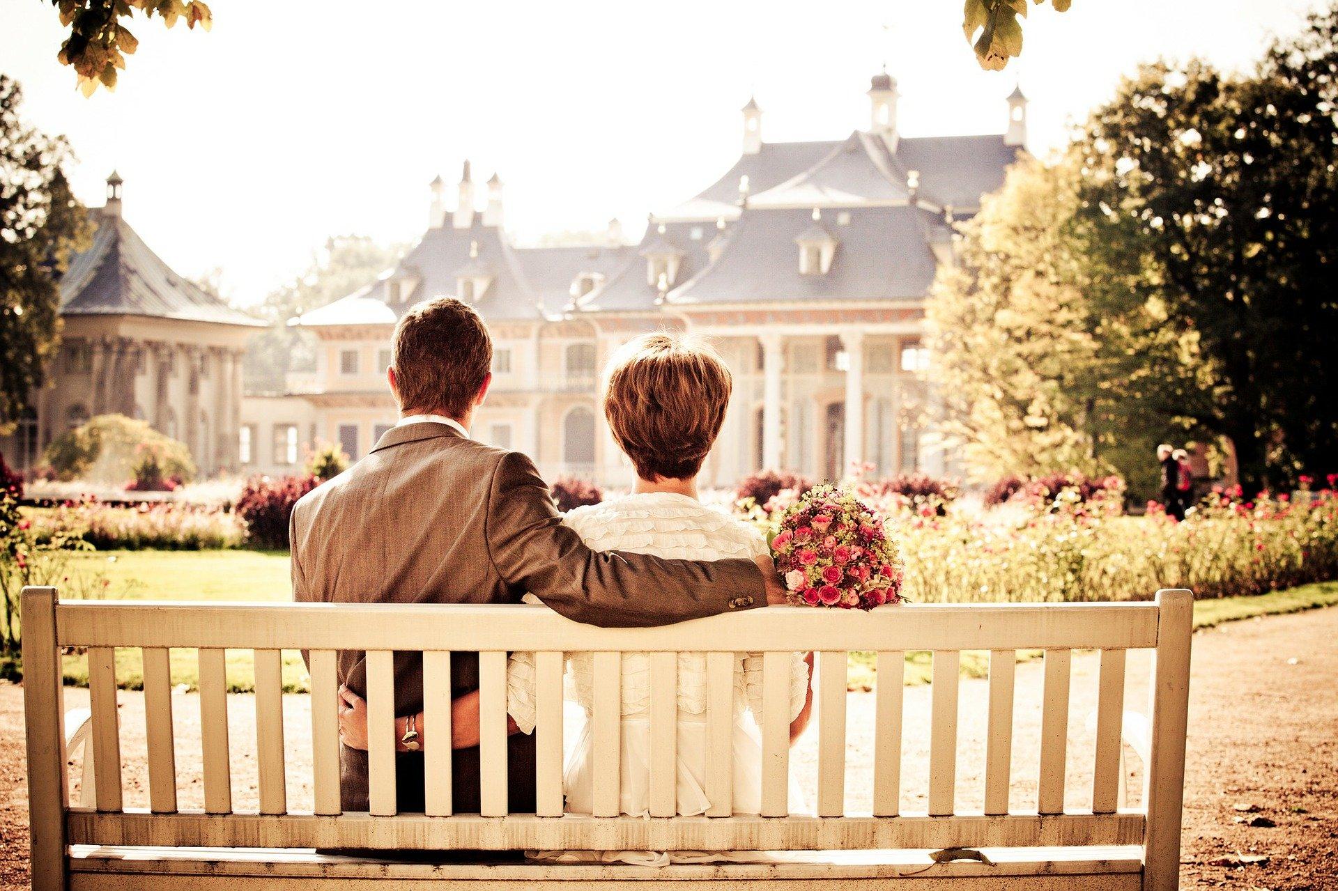 couple, bench, trees, mansion